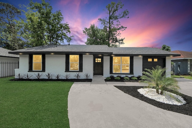 7622 Parker Rd, Houston, TX 77016 - single story home with brick siding, a shingled roof, and an attached garage