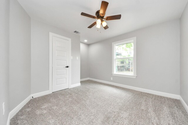 7622 Parker Rd, Houston, TX 77016 - unfurnished room featuring carpet, a ceiling fan, and baseboards