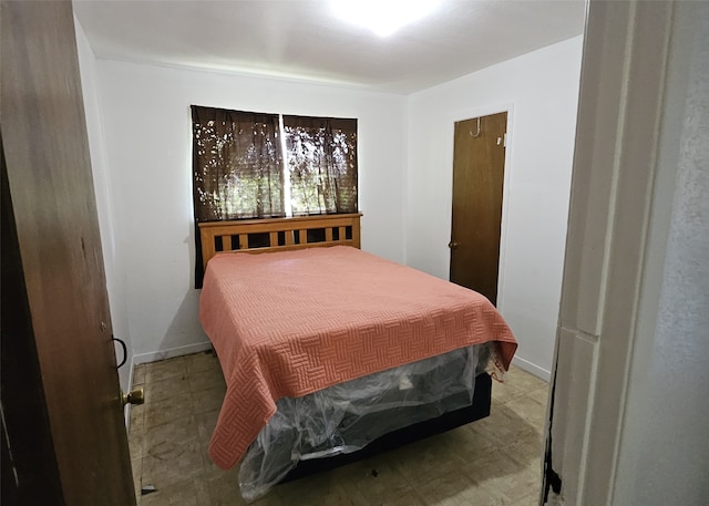 6315 Mardale Dr, Houston, TX 77016 - bedroom featuring tile patterned floors