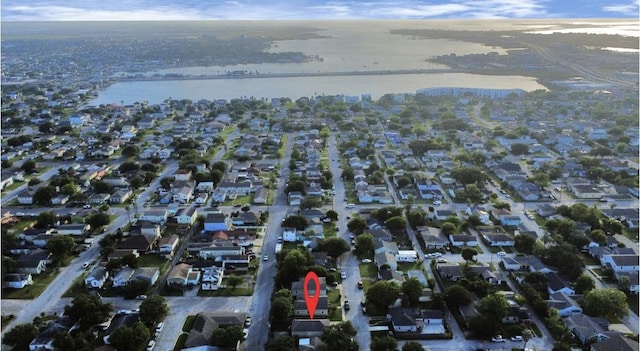 5323 Menard Ave, Galveston, TX 77551 - aerial overview of property's location with a nearby body of water and nearby suburban area