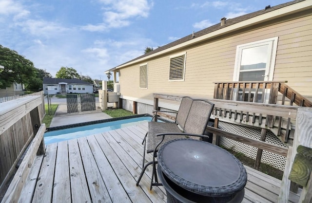 5323 Menard Ave, Galveston, TX 77551 - deck with a fenced backyard