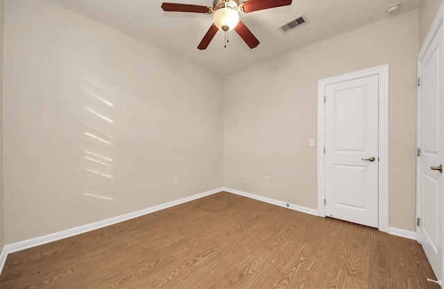 5323 Menard Ave, Galveston, TX 77551 - unfurnished room featuring wood finished floors, ceiling fan, baseboards, and a smoke detector