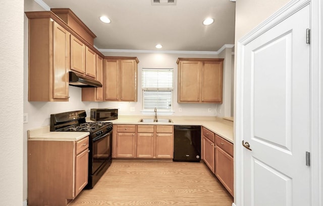 5323 Menard Ave, Galveston, TX 77551 - kitchen featuring black appliances, a sink, under cabinet range hood, light countertops, and ornamental molding