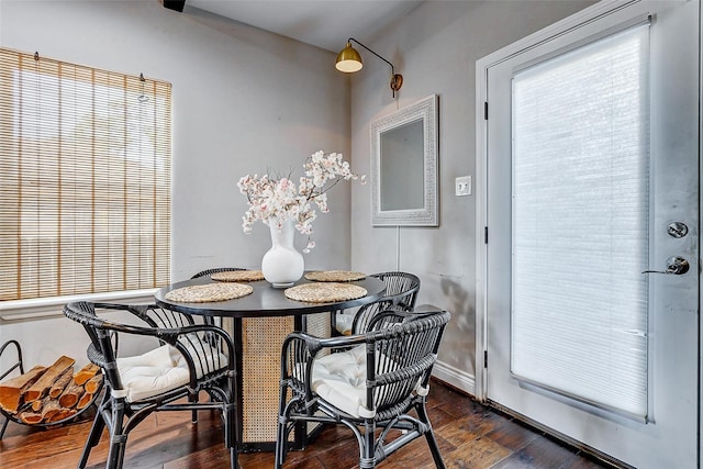 3108 Rogers St, Houston, TX 77022 - dining room with dark wood-style floors and baseboards