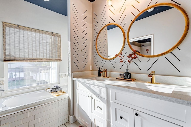 3108 Rogers St, Houston, TX 77022 - full bathroom with double vanity, a bath, and tile patterned floors