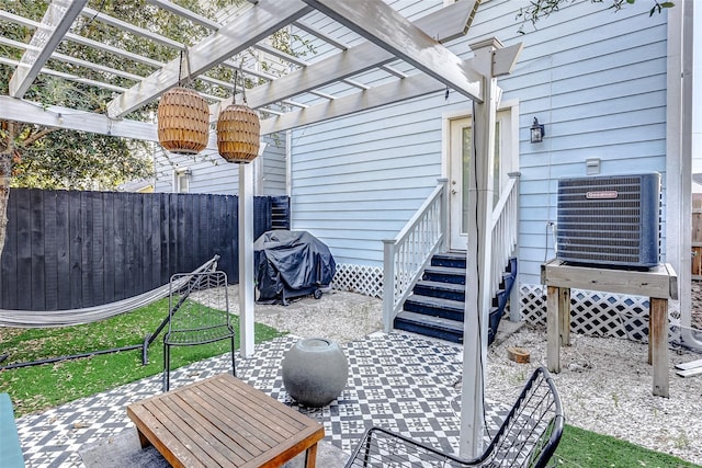 3108 Rogers St, Houston, TX 77022 - view of patio featuring central AC unit, a pergola, fence, and grilling area