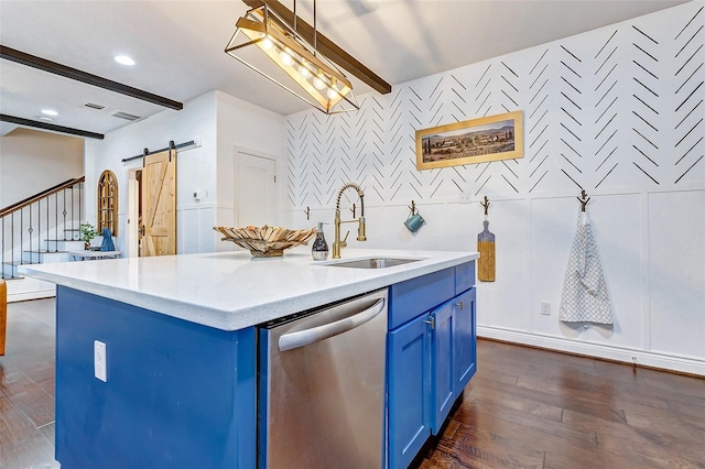 3108 Rogers St, Houston, TX 77022 - kitchen with blue cabinetry, dishwasher, a sink, a barn door, and dark wood-type flooring
