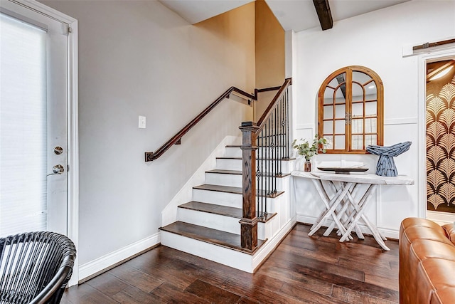 3108 Rogers St, Houston, TX 77022 - stairway with wood finished floors, beam ceiling, and baseboards