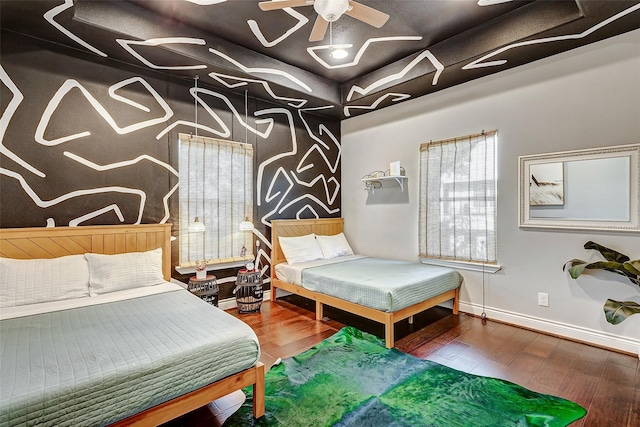 3108 Rogers St, Houston, TX 77022 - bedroom featuring baseboards, wood finished floors, and multiple windows