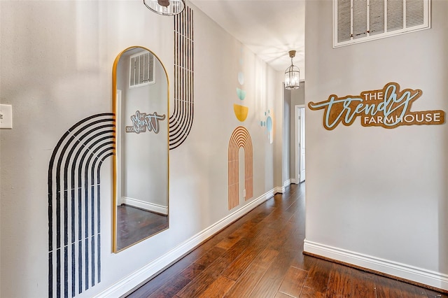 3108 Rogers St, Houston, TX 77022 - hallway with dark wood-type flooring and baseboards