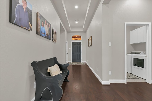 10718 Winding Green Dr, Humble, TX 77338 - corridor with washer and dryer, wood finished floors, baseboards, and recessed lighting