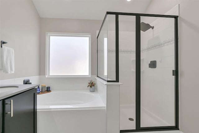 10718 Winding Green Dr, Humble, TX 77338 - bathroom featuring a shower stall, a bath, and vanity