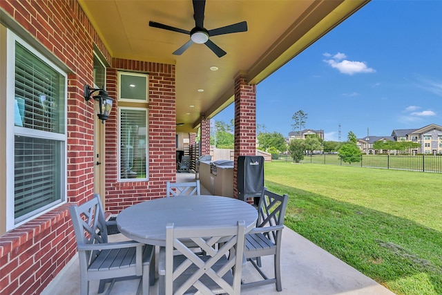 10718 Winding Green Dr, Humble, TX 77338 - view of patio featuring a ceiling fan and outdoor dining area