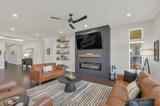 10718 Winding Green Dr, Humble, TX 77338 - living area with wood finished floors, a ceiling fan, recessed lighting, a large fireplace, and baseboards
