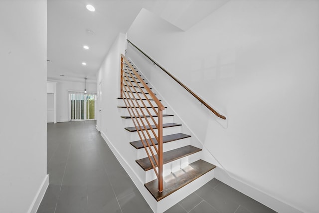 1515 Egypt St, Houston, TX 77009 - stairs with baseboards, recessed lighting, and tile patterned floors