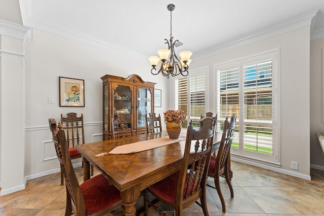 5418 Brook Bend Dr, Sugar Land, TX 77479 - dining space featuring a chandelier, ornamental molding, and baseboards