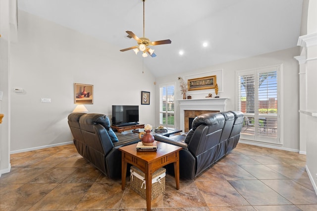 5418 Brook Bend Dr, Sugar Land, TX 77479 - living room featuring a tiled fireplace, ceiling fan, baseboards, high vaulted ceiling, and recessed lighting
