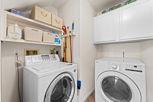 5418 Brook Bend Dr, Sugar Land, TX 77479 - laundry room with washer and clothes dryer, cabinet space, and baseboards