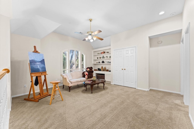 5418 Brook Bend Dr, Sugar Land, TX 77479 - living area with carpet floors, ceiling fan, baseboards, built in features, and lofted ceiling