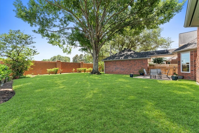 5418 Brook Bend Dr, Sugar Land, TX 77479 - view of yard with a patio
