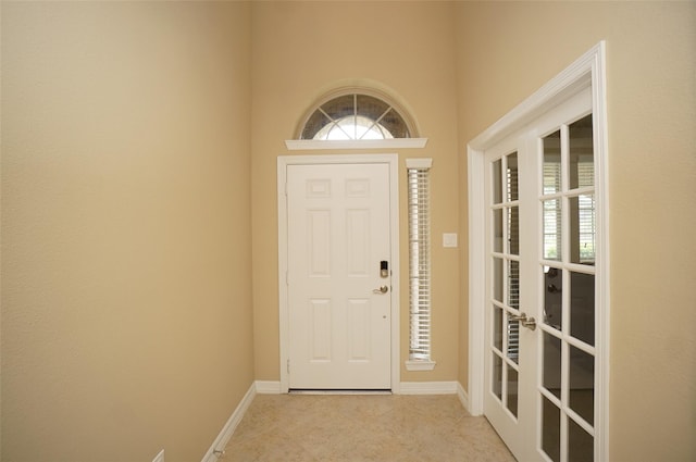 3411 Hawkins Glen Ln, Katy, TX 77449 - entrance foyer with plenty of natural light, baseboards, and french doors