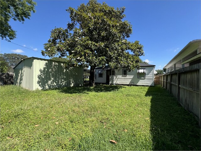 2105 12th St, Galena Park, TX 77547 - view of yard with an outdoor structure