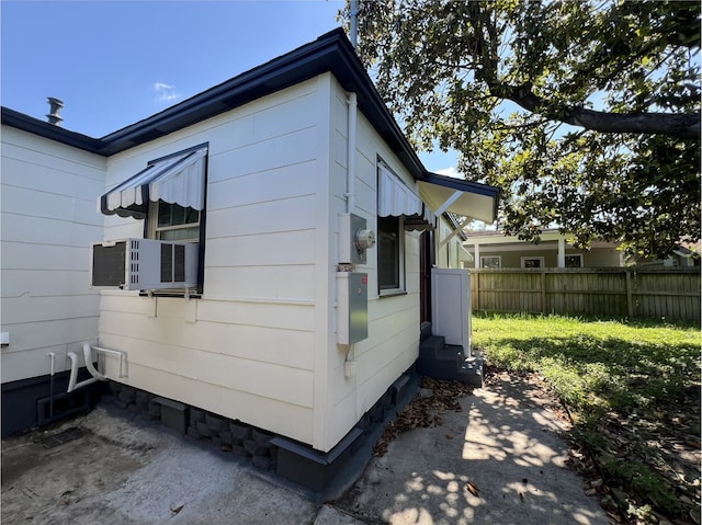 2105 12th St, Galena Park, TX 77547 - view of outdoor structure with fence, entry steps, and cooling unit
