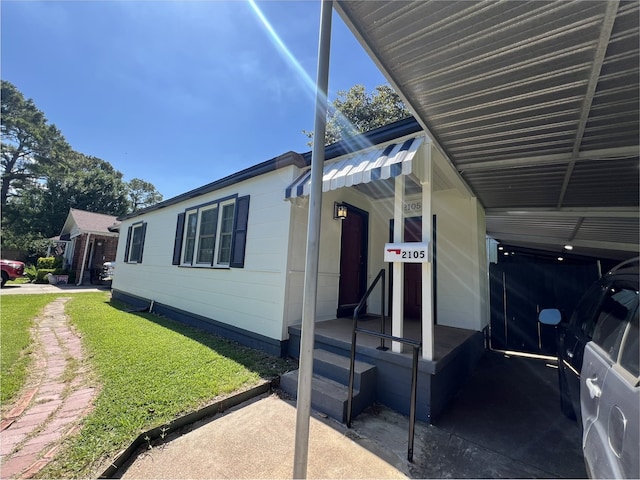 2105 12th St, Galena Park, TX 77547 - view of property exterior with a yard