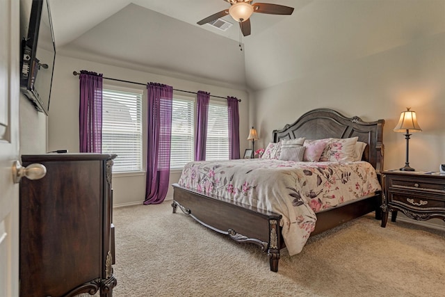 bedroom with carpet floors, lofted ceiling, ceiling fan, and baseboards