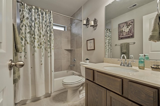 full bathroom featuring tile patterned flooring, toilet, shower / bathtub combination with curtain, and vanity