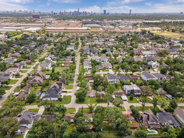 6502 Saxet St, Houston, TX 77055 - aerial view of property and surrounding area featuring nearby suburban area and a skyline view