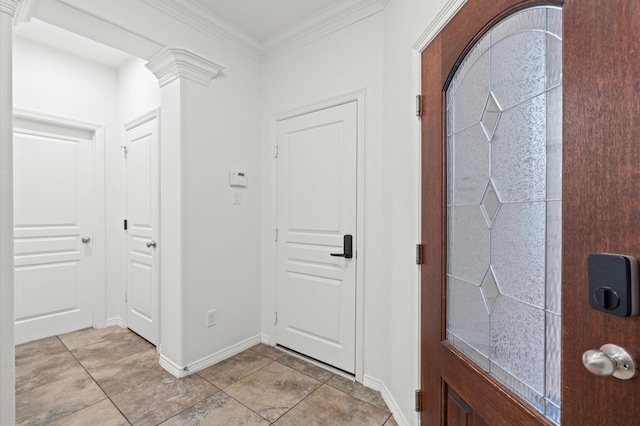 1117 Beall Landing Ct, Houston, TX 77008 - entryway featuring light tile patterned floors, baseboards, and crown molding