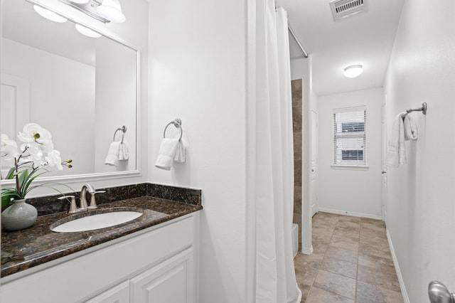1117 Beall Landing Ct, Houston, TX 77008 - bathroom with vanity and baseboards