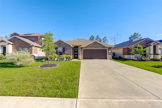 12917 S Winding Pines Dr, Tomball, TX 77375 - single story home featuring an attached garage, driveway, a front lawn, and stone siding