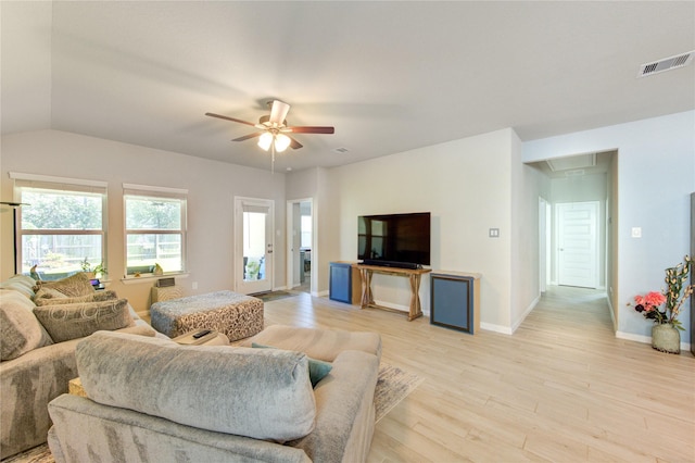 12917 S Winding Pines Dr, Tomball, TX 77375 - living room featuring attic access, ceiling fan, light wood-style floors, and baseboards