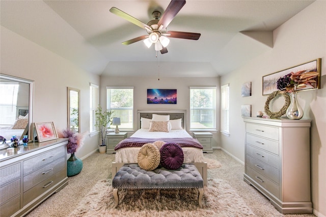 12917 S Winding Pines Dr, Tomball, TX 77375 - bedroom featuring baseboards, lofted ceiling, light carpet, and ceiling fan
