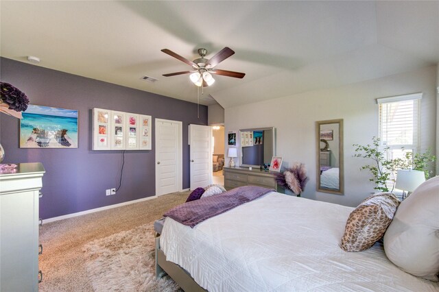 12917 S Winding Pines Dr, Tomball, TX 77375 - carpeted bedroom with a ceiling fan, baseboards, and ensuite bathroom