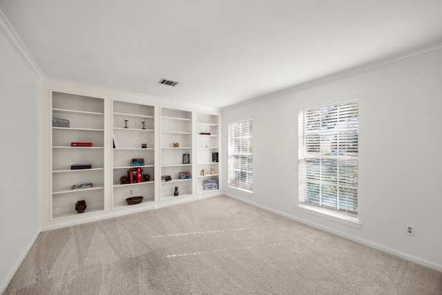 4402 Chipping Ct, Sugar Land, TX 77479 - unfurnished room with baseboards, ornamental molding, carpet flooring, and built in shelves