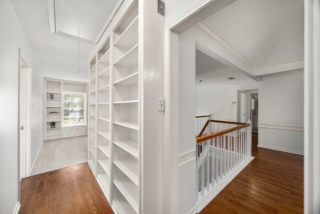4402 Chipping Ct, Sugar Land, TX 77479 - hallway featuring attic access, an upstairs landing, wood finished floors, baseboards, and ornamental molding