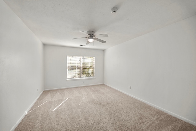 4402 Chipping Ct, Sugar Land, TX 77479 - spare room featuring ceiling fan, light colored carpet, baseboards, and a smoke detector