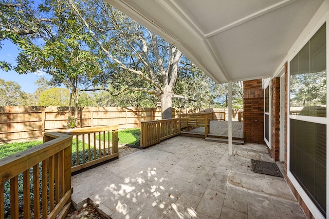 4402 Chipping Ct, Sugar Land, TX 77479 - wooden terrace featuring a fenced backyard