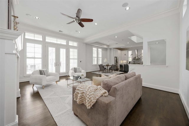 812 W Drew St, Houston, TX 77006 - living area with crown molding, french doors, baseboards, dark wood-type flooring, and a ceiling fan