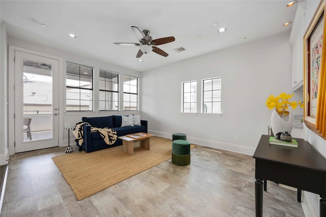 812 W Drew St, Houston, TX 77006 - living area featuring recessed lighting, a ceiling fan, wood finished floors, and baseboards