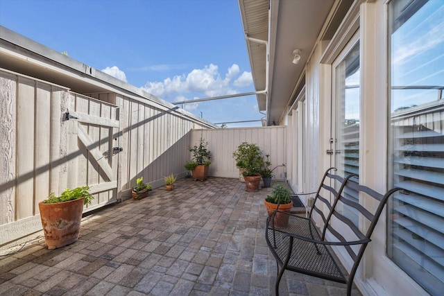 5905 Sugar Hill Dr Unit 221, Houston, TX 77057 - view of patio / terrace featuring fence