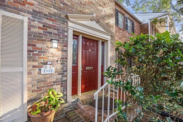5905 Sugar Hill Dr Unit 221, Houston, TX 77057 - doorway to property featuring brick siding
