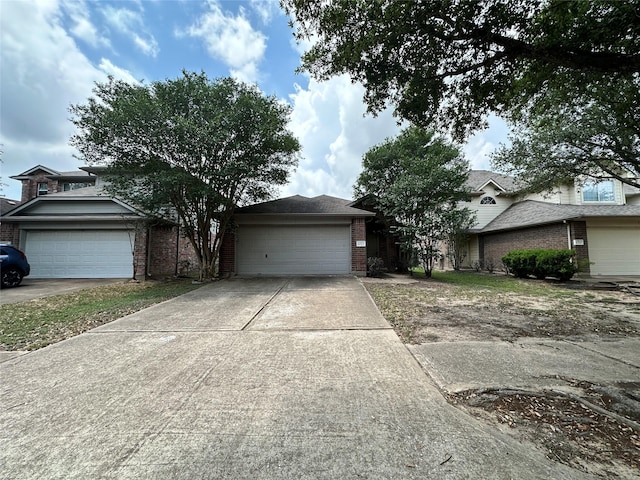 6723 Highwind Bend Ln, Katy, TX 77449 - view of front of house with brick siding and a garage