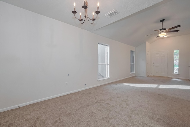 6723 Highwind Bend Ln, Katy, TX 77449 - unfurnished room featuring vaulted ceiling, light carpet, a chandelier, baseboards, and a ceiling fan