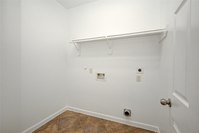 laundry room featuring hookup for an electric dryer, hookup for a gas dryer, hookup for a washing machine, and baseboards