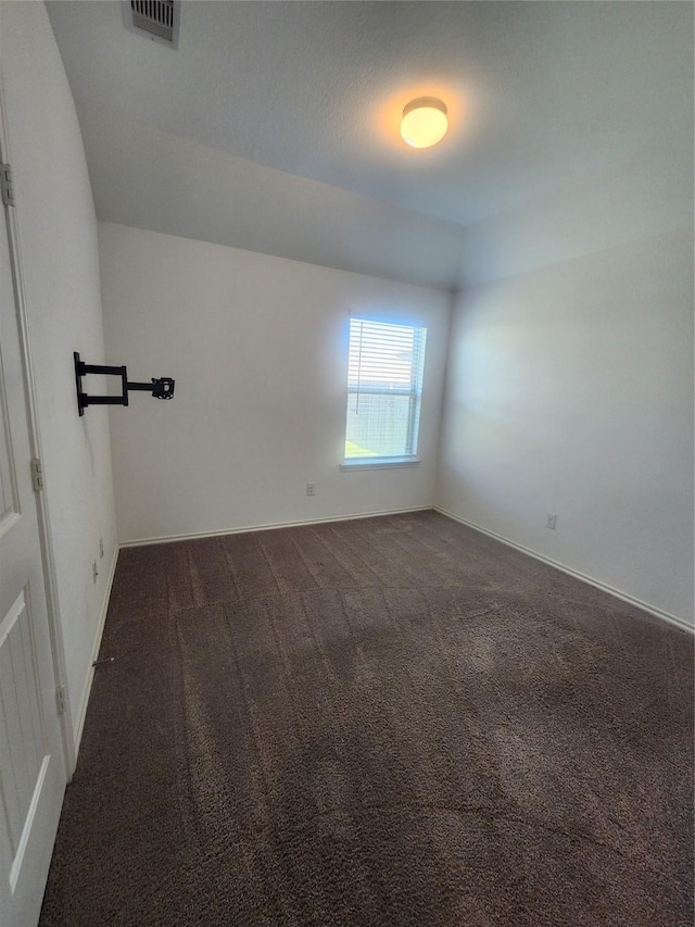 23716 Wood Green Terrace Dr, New Caney, TX 77357 - unfurnished room featuring dark colored carpet and baseboards