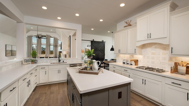 20315 Desert Foal Dr, Tomball, TX 77377 - kitchen featuring stainless steel appliances, a sink, recessed lighting, light countertops, and white cabinets